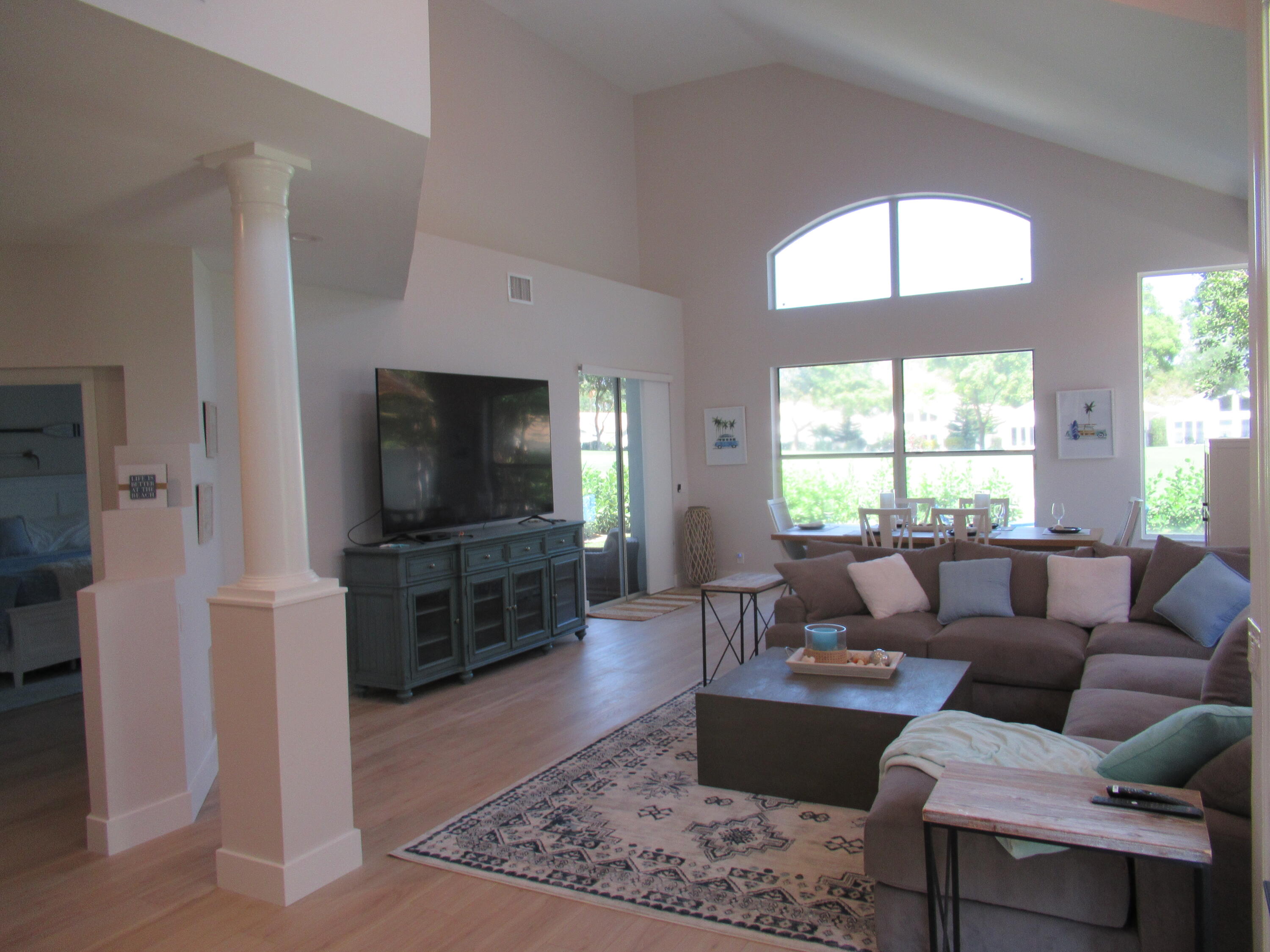2237 Northwest 53rd Street Boca Raton, FL 33496 - Photo 9 of 76 a living room with furniture and a flat screen tv