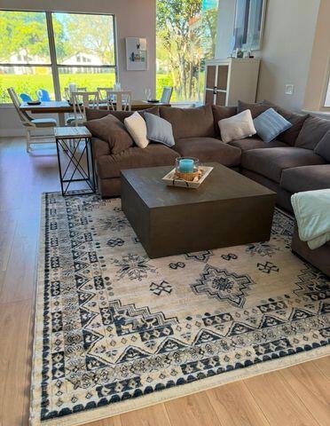 2237 Northwest 53rd Street Boca Raton, FL 33496 - Photo 10 of 76 a living room with furniture window and a wooden floor