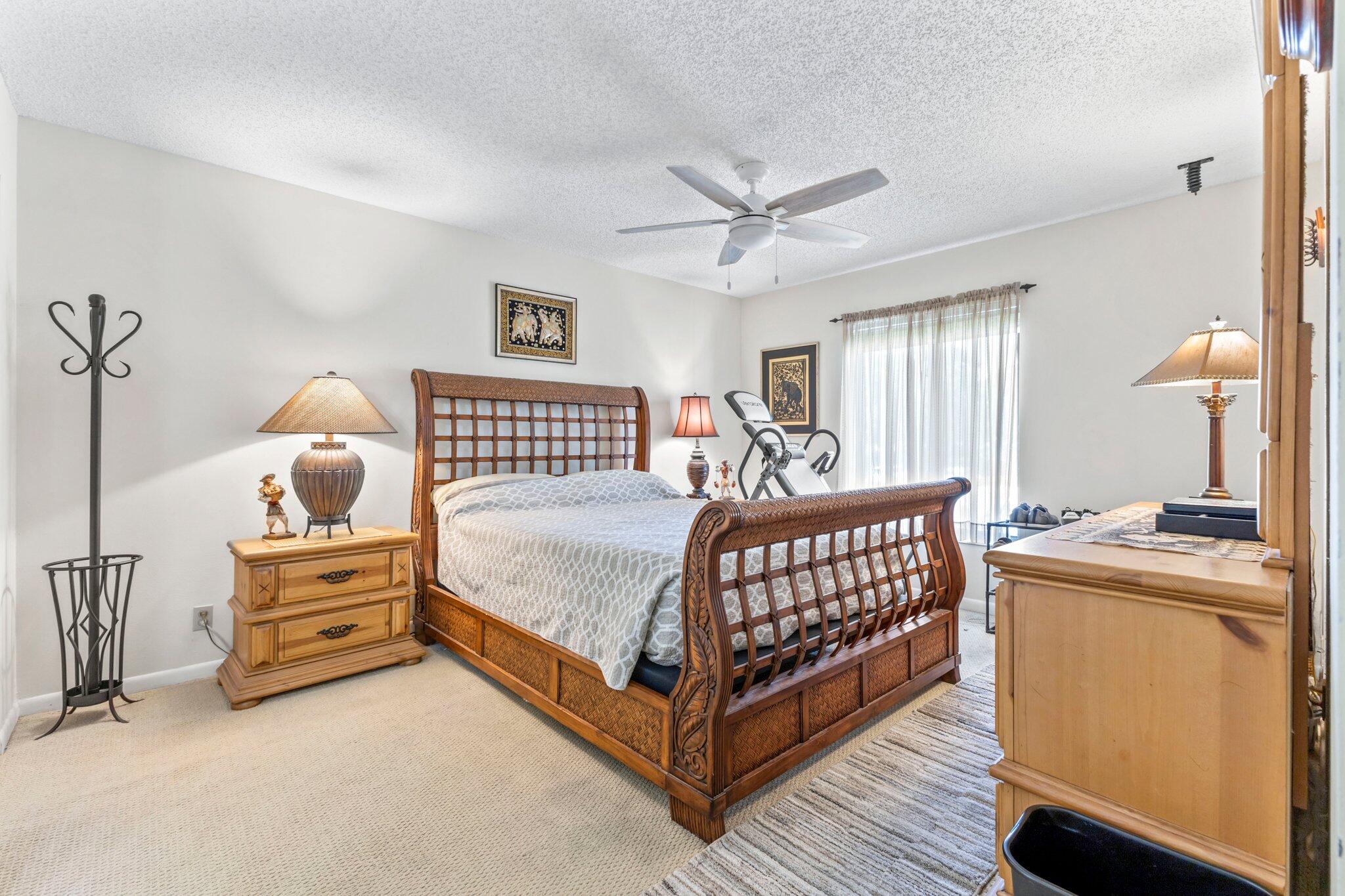 2732 Southwest Matheson Avenue, Unit 112B2 Palm City, FL 34990 - Photo 12 of 28 Primary Bedroom