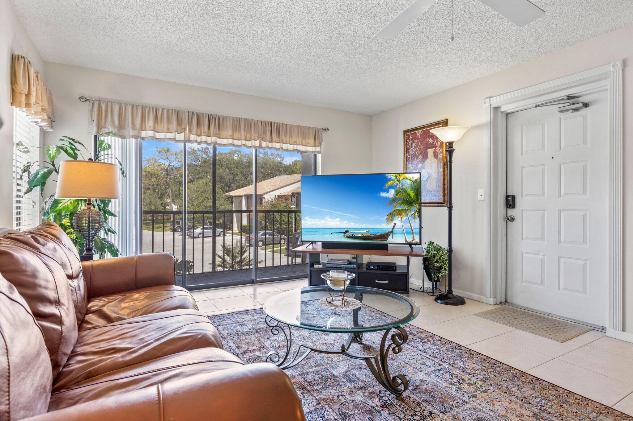 2732 Southwest Matheson Avenue, Unit 112B2 Palm City, FL 34990 - Photo 4 of 28 Living Room