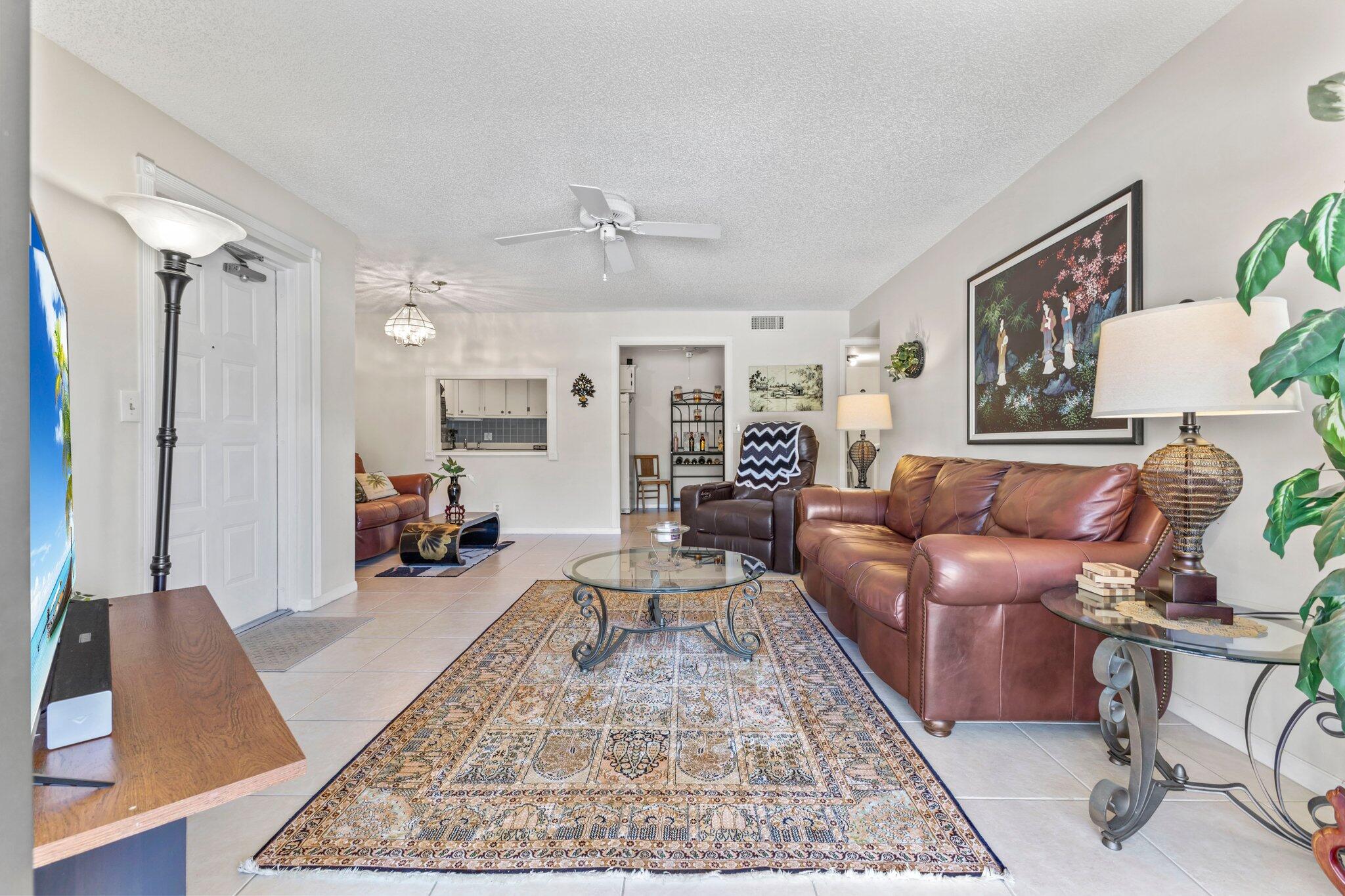 2732 Southwest Matheson Avenue, Unit 112B2 Palm City, FL 34990 - Photo 6 of 28 Living Room