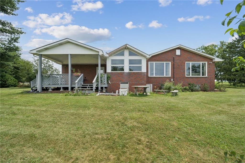 277 Highberger Road Herminie, PA 15637 - Photo 2 of 26 EXTERIOR REAR VIEW OF SUNROOM & DECK