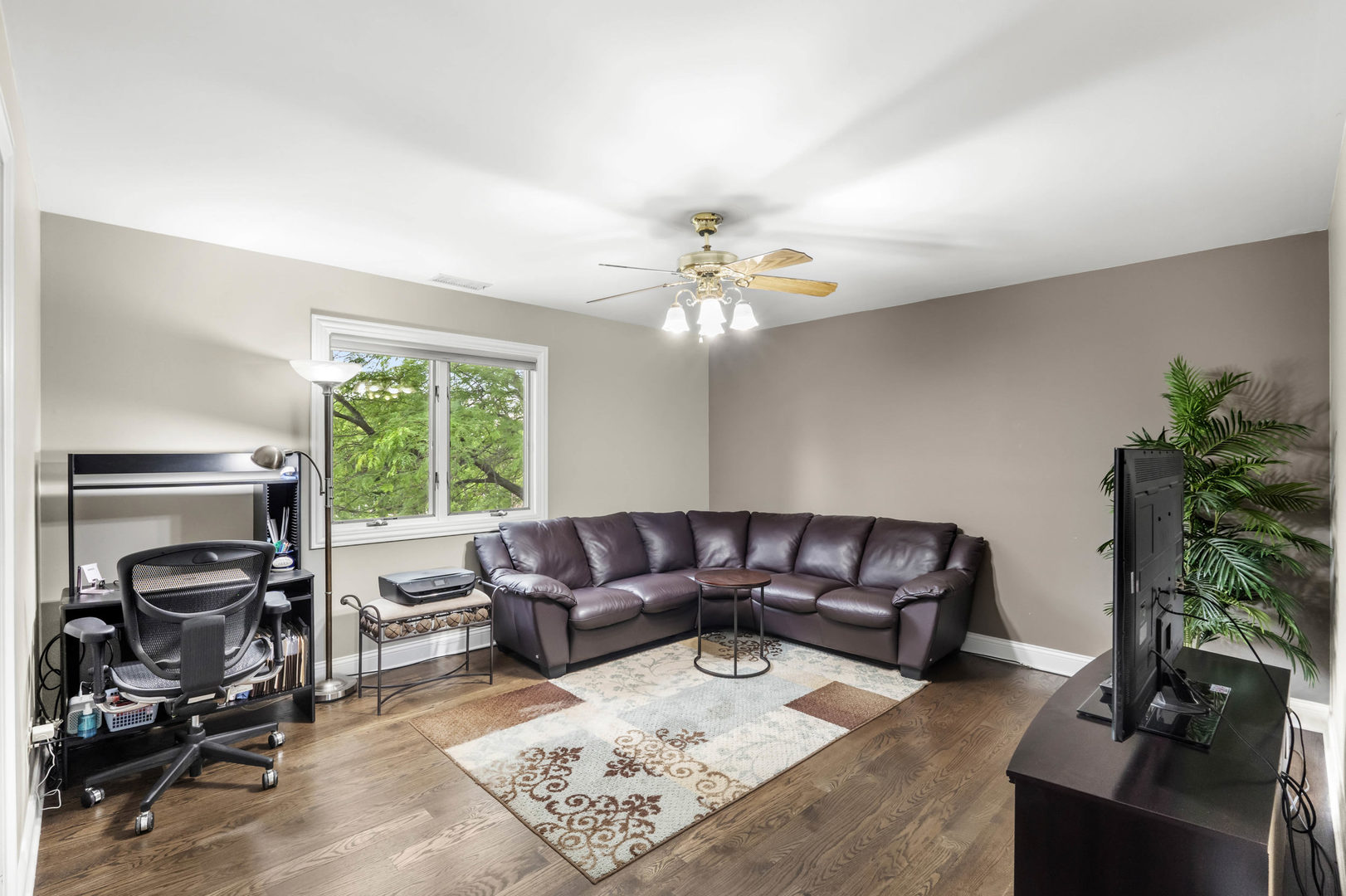 322 Orchard Lane Beecher, IL 60401 - Photo 21 of 38 a living room with furniture and a flat screen tv