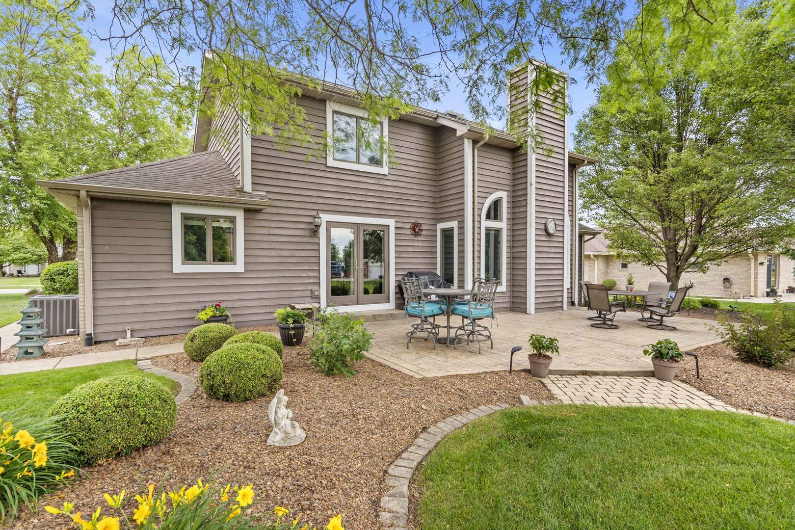322 Orchard Lane Beecher, IL 60401 - Photo 26 of 38 a view of a backyard with sitting area