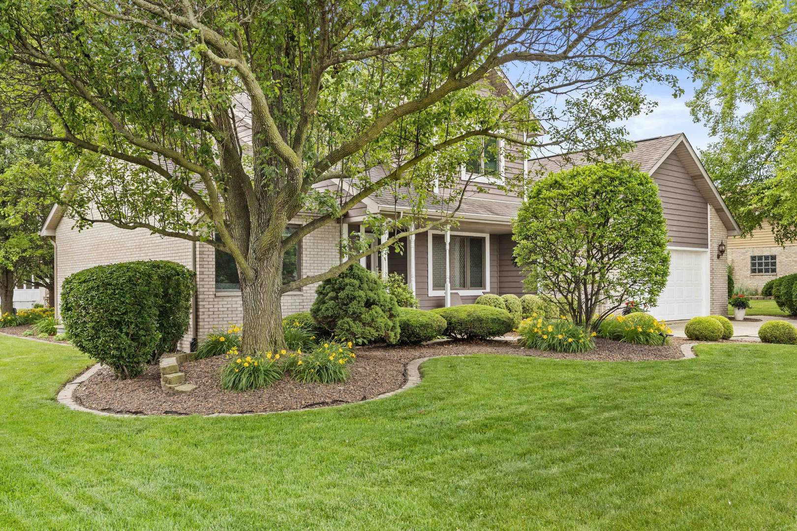322 Orchard Lane Beecher, IL 60401 - Photo 29 of 38 a view of a house with a yard and plants
