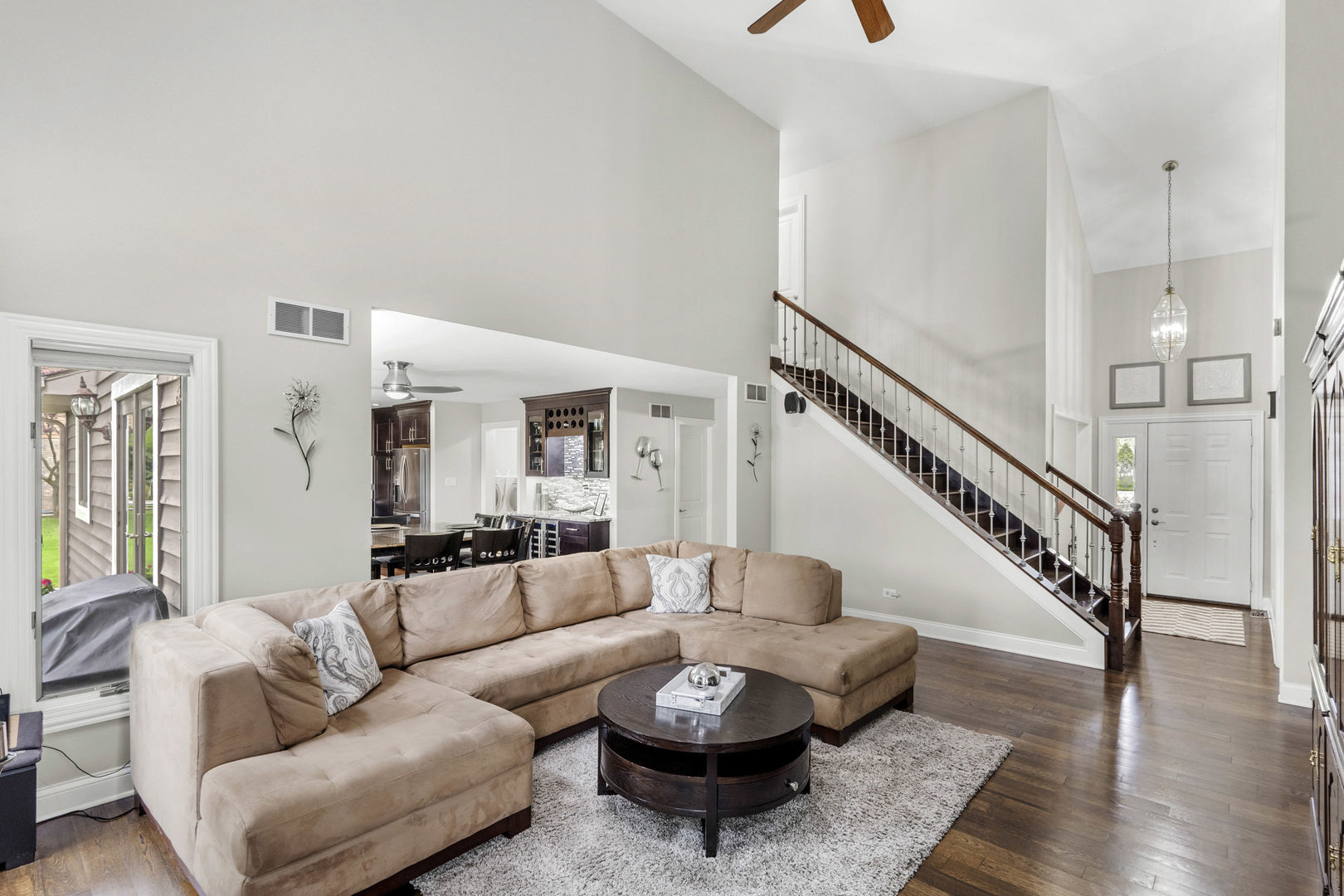 322 Orchard Lane Beecher, IL 60401 - Photo 5 of 38 a living room with furniture and a wooden floor