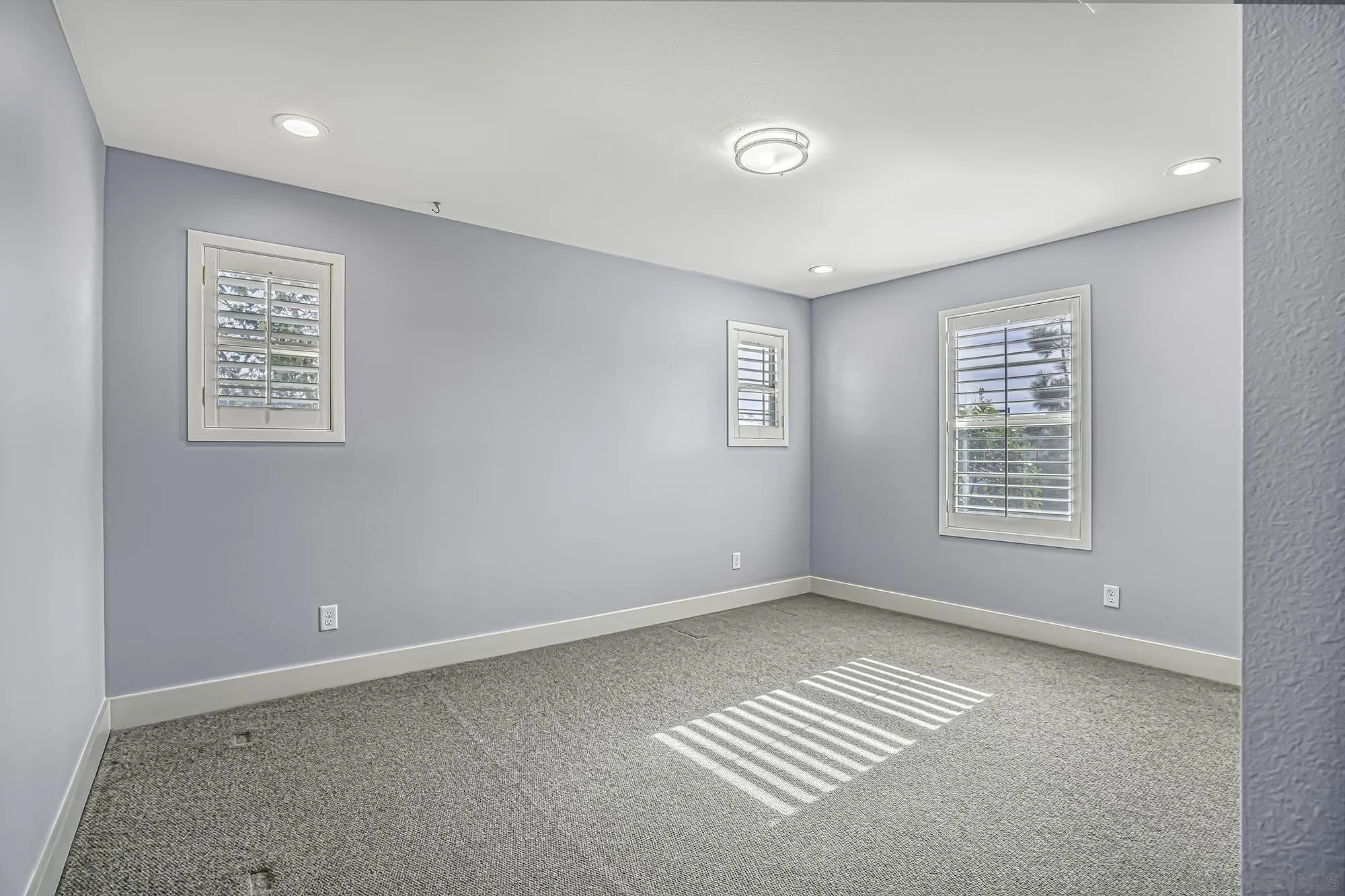 145 Stonesteps Way Encinitas, CA 92024 - Photo 13 of 25 a view of an empty room with a window