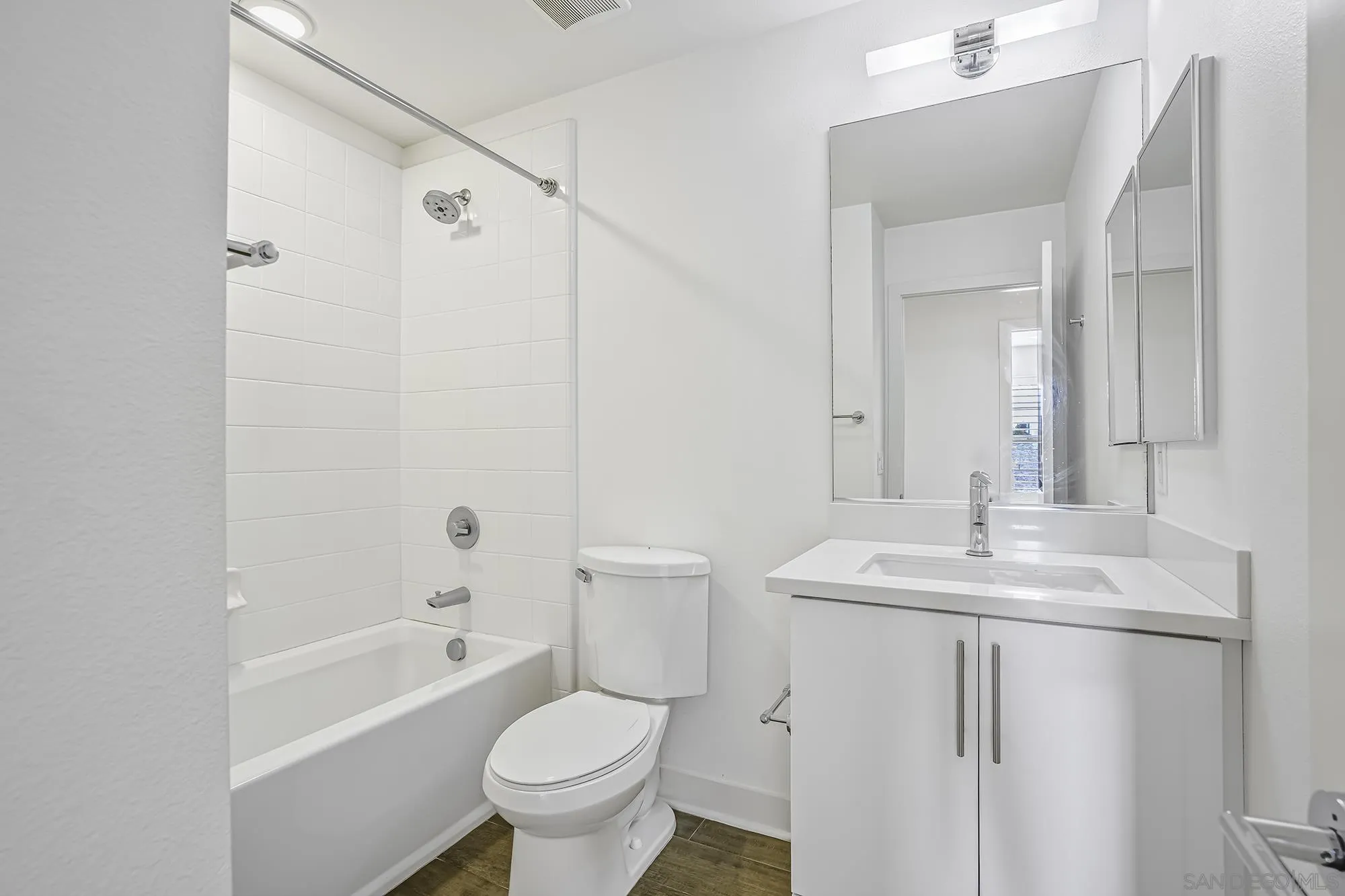145 Stonesteps Way Encinitas, CA 92024 - Photo 16 of 25 a bathroom with a sink toilet and shower