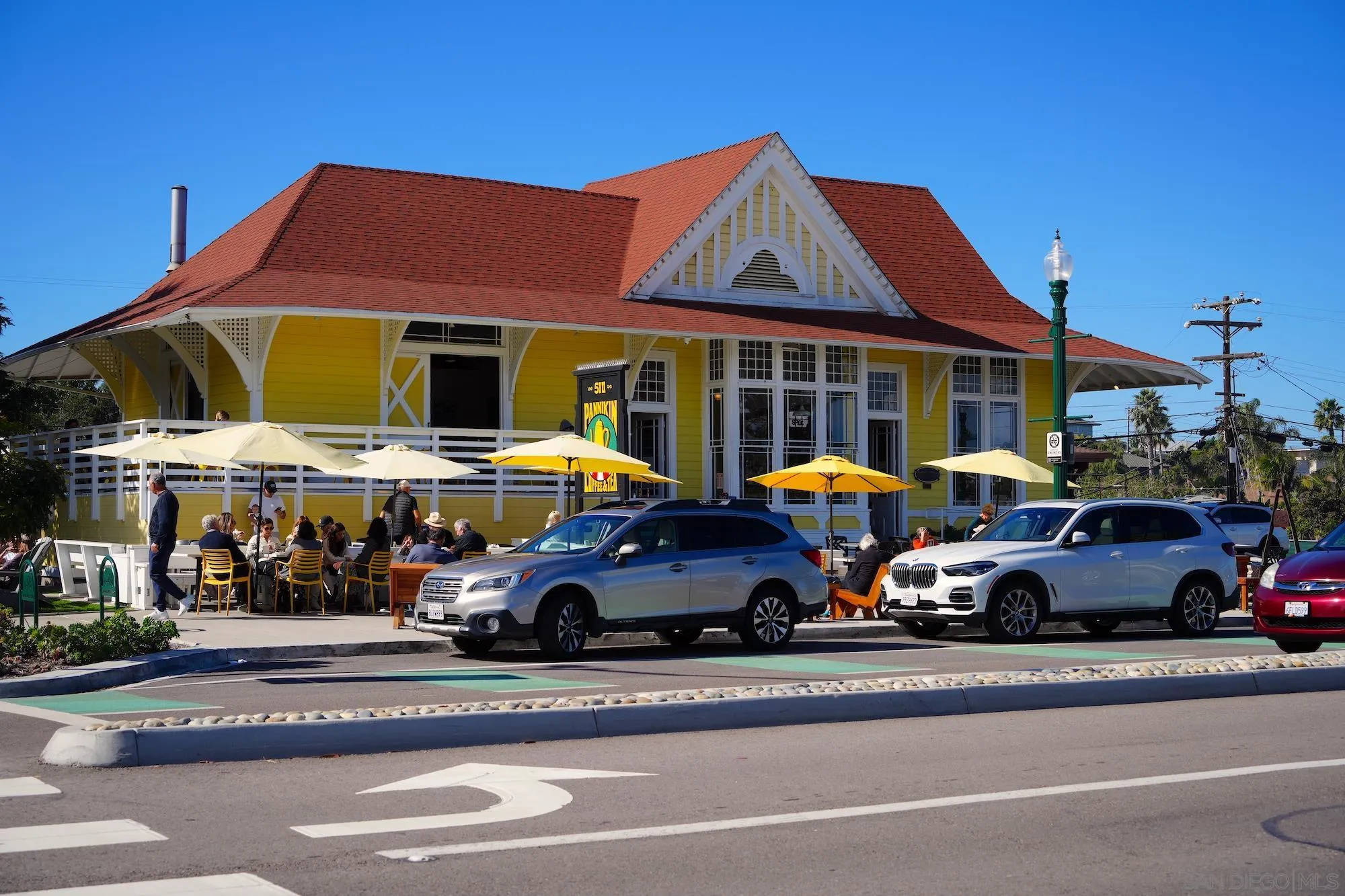 145 Stonesteps Way Encinitas, CA 92024 - Photo 25 of 25 a front view of a building with cars parked