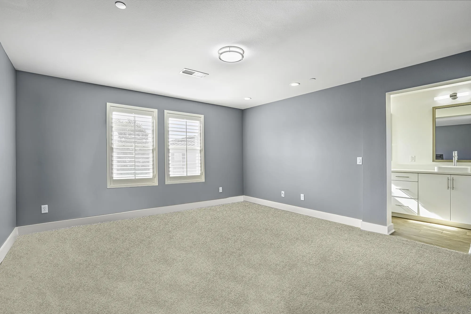 145 Stonesteps Way Encinitas, CA 92024 - Photo 7 of 25 a view of an empty room with a window