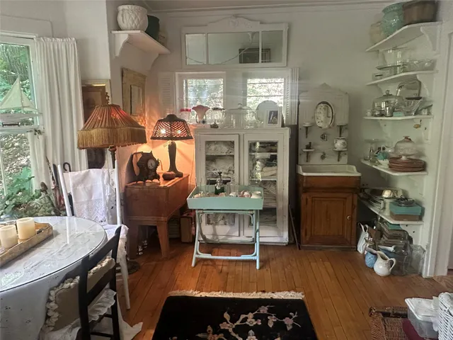 a bedroom with bed and window