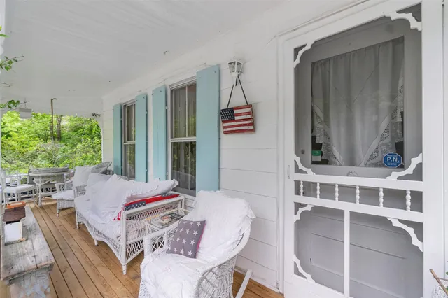 a view of balcony with small garden