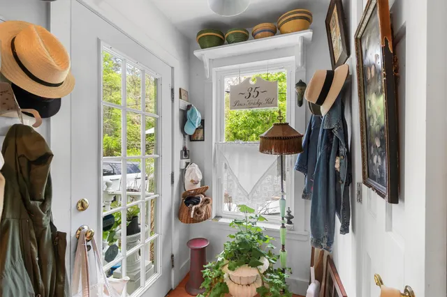 a kitchen with a refrigerator and a stove