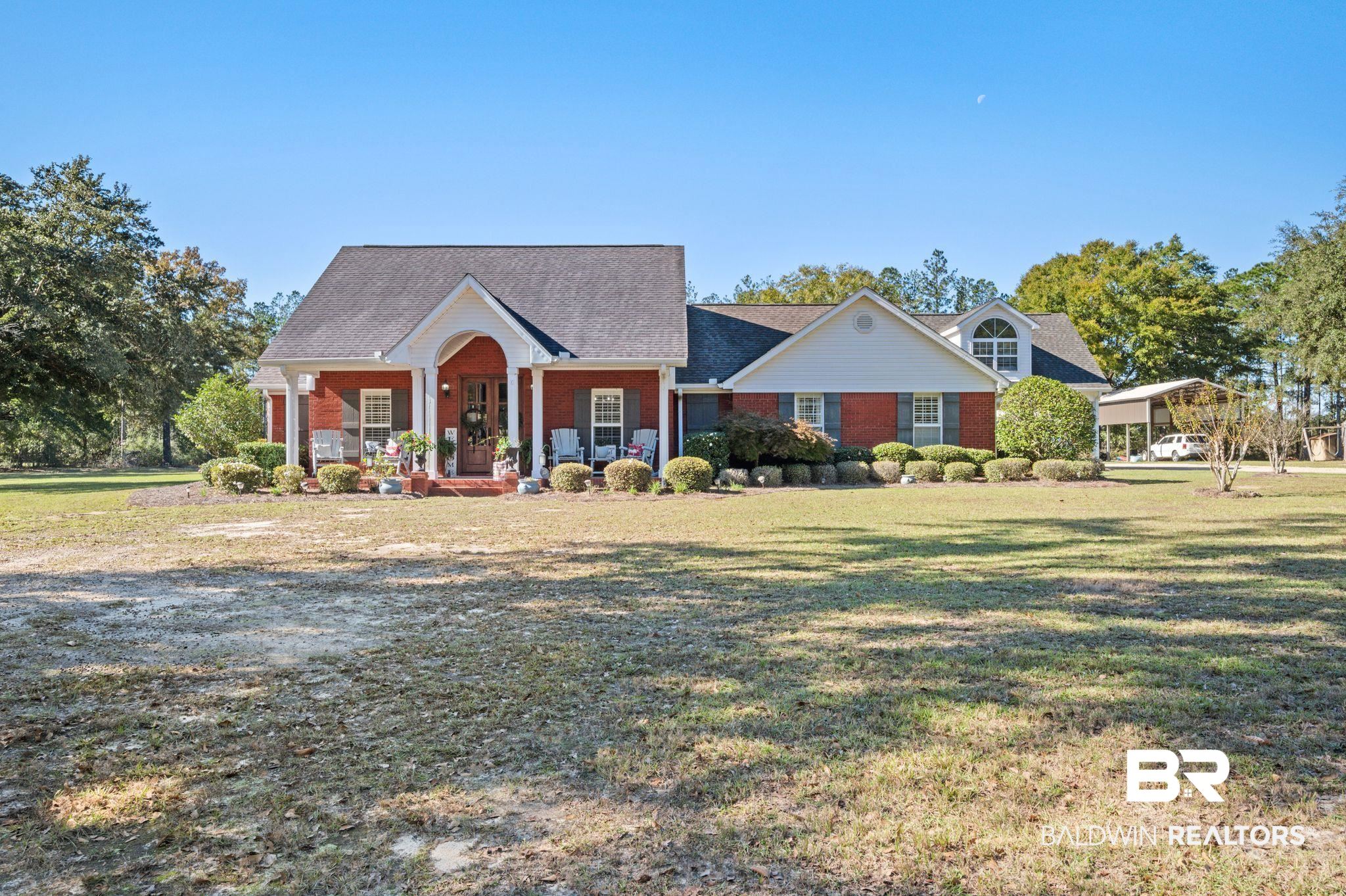 38211-d) V R Byrd Road Bay Minette, AL 36507 - Photo 2 of 58 View of front of property with a front yard and a porch