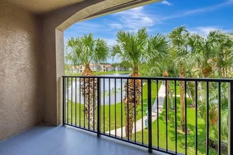 15155 Michelangelo Boulevard, Unit 306 Delray Beach, FL 33446 - Photo 12 of 32 a view of a porch