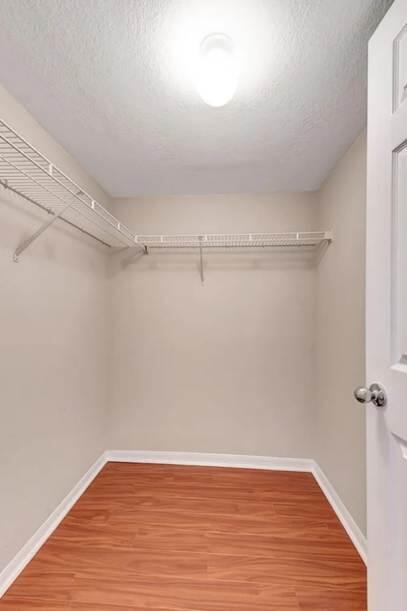 15155 Michelangelo Boulevard, Unit 306 Delray Beach, FL 33446 - Photo 13 of 32 a view of a room with wooden floor