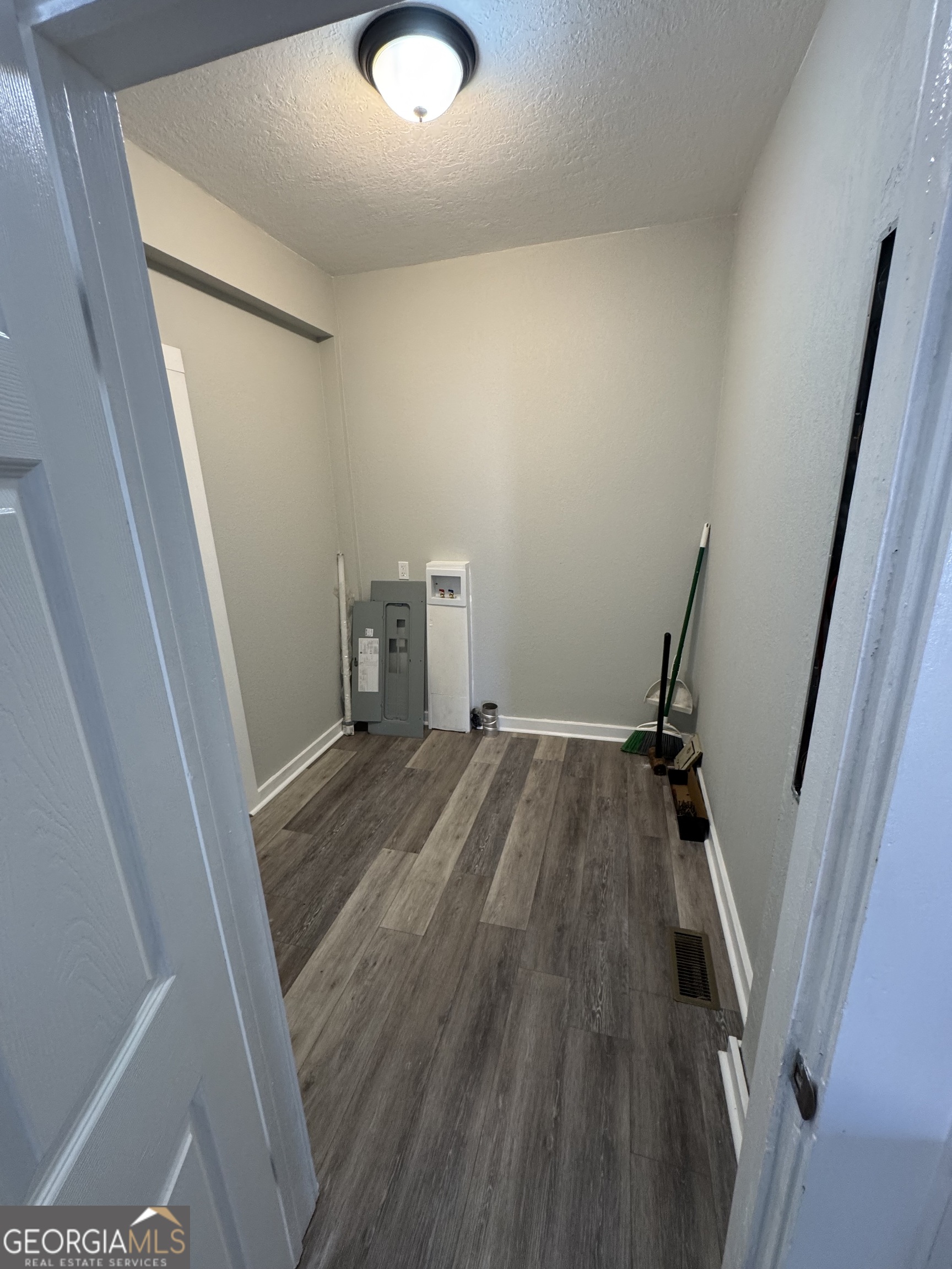 37 West Church Street Elberton, GA 30635 - Photo 15 of 37 a view of a room with wooden floor