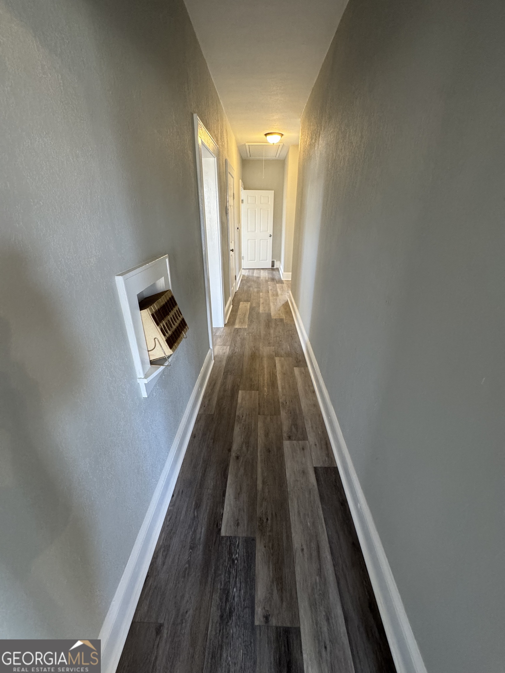 37 West Church Street Elberton, GA 30635 - Photo 16 of 37 a view of balcony with wooden floor