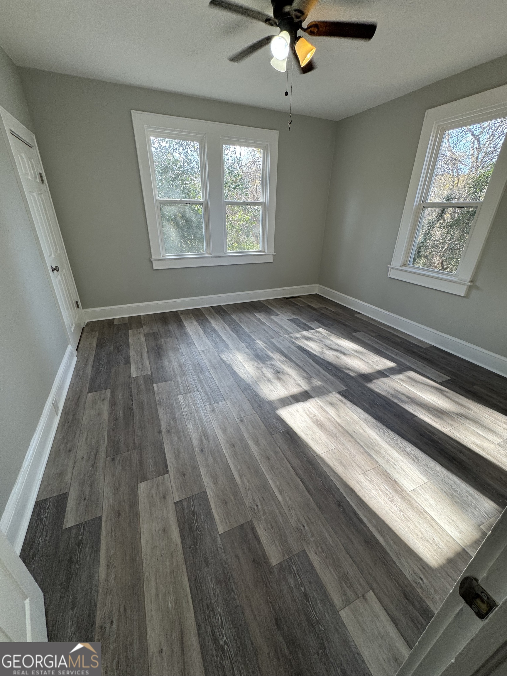 37 West Church Street Elberton, GA 30635 - Photo 20 of 37 a view of an empty room and window