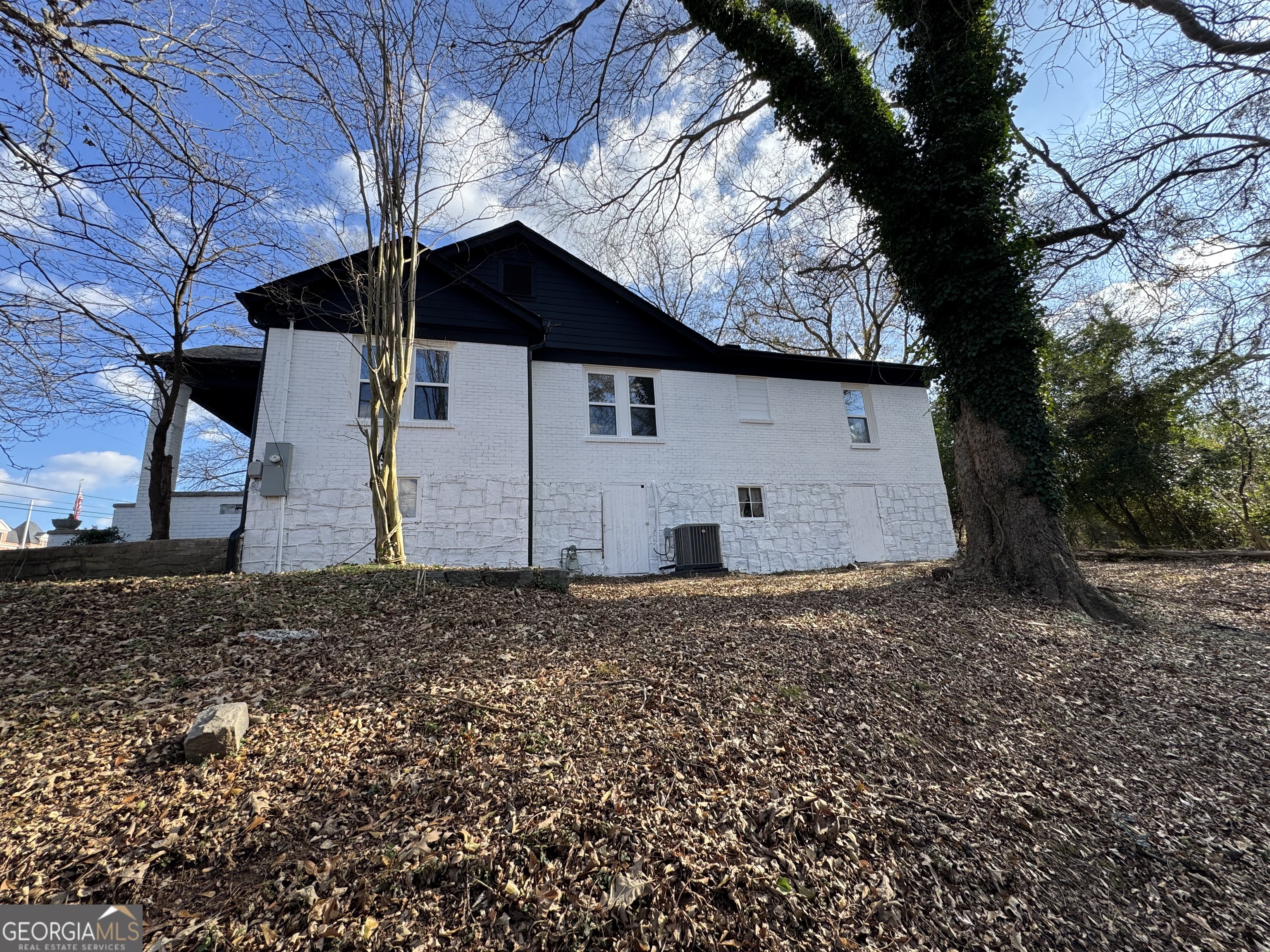 37 West Church Street Elberton, GA 30635 - Photo 27 of 37 a view of a house with a yard