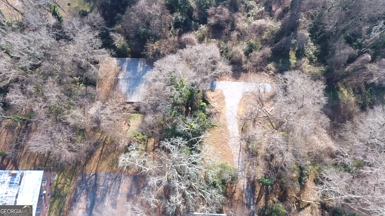 37 West Church Street Elberton, GA 30635 - Photo 28 of 37 a view of a house with a yard