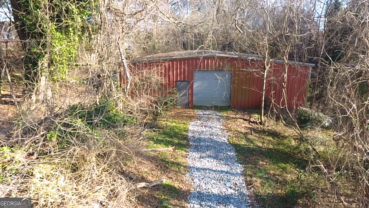 37 West Church Street Elberton, GA 30635 - Photo 3 of 37 a view of a backyard with pathway