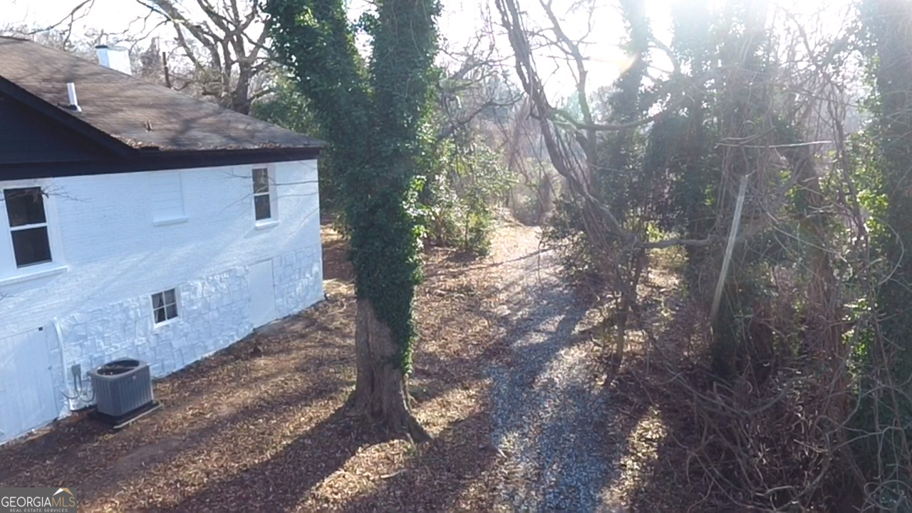 37 West Church Street Elberton, GA 30635 - Photo 36 of 37 a view of a house with a yard