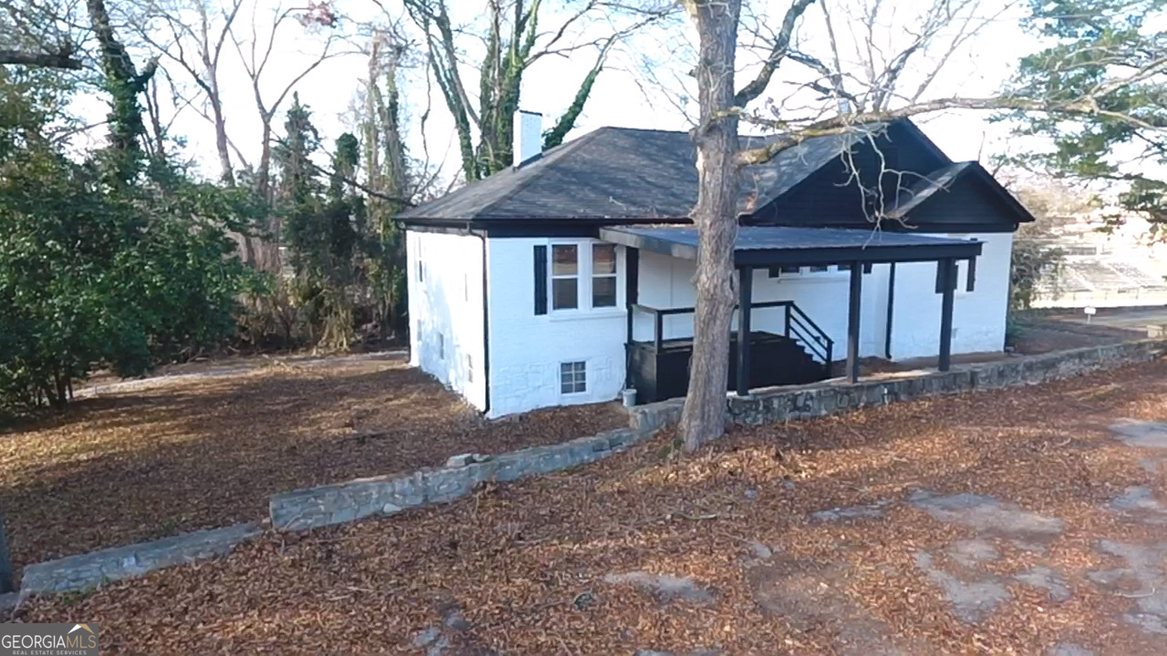 37 West Church Street Elberton, GA 30635 - Photo 7 of 37 a view of house with a yard