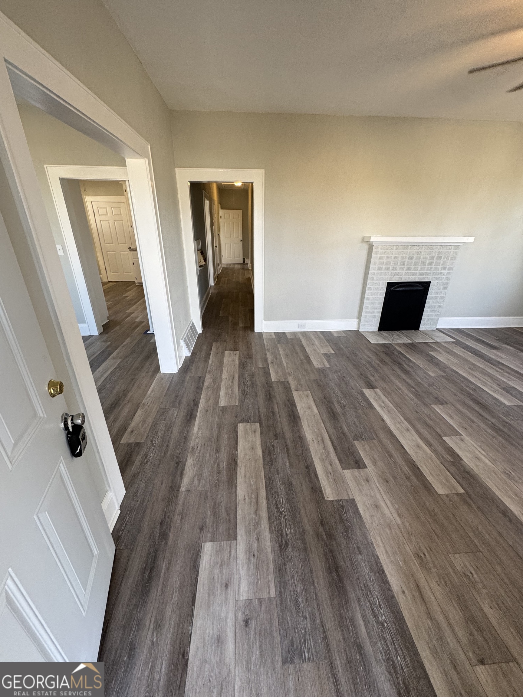 37 West Church Street Elberton, GA 30635 - Photo 9 of 37 a view of empty room with wooden floor