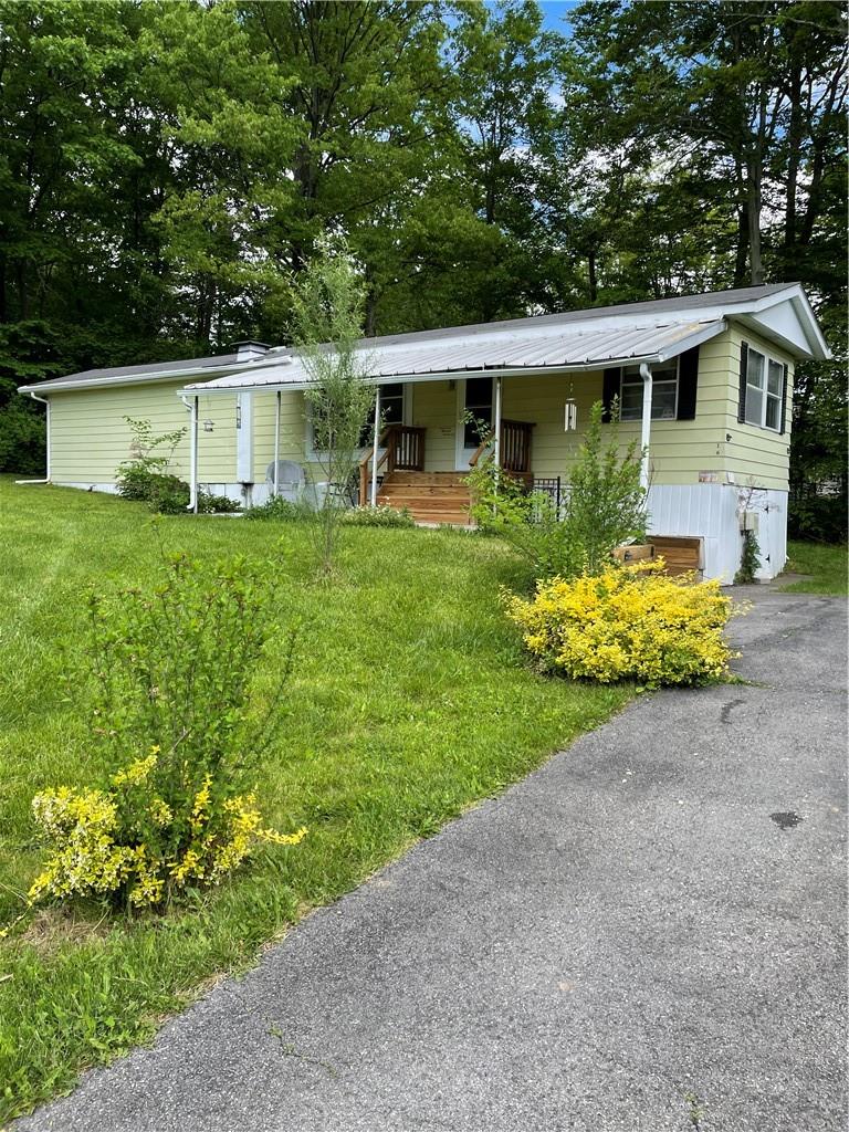 16 Baumville Road Beacon, NY 12508 - Photo 1 of 1 front view of a house with a yard