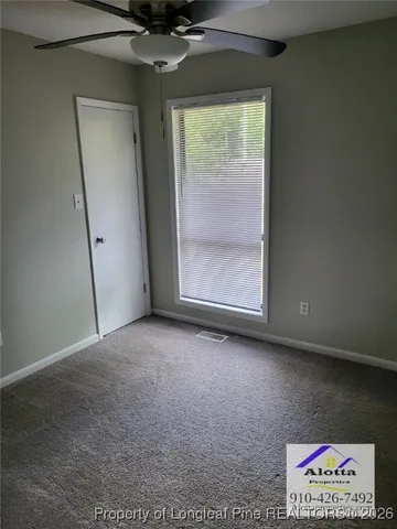 a bathroom with a sink a toilet and a shower