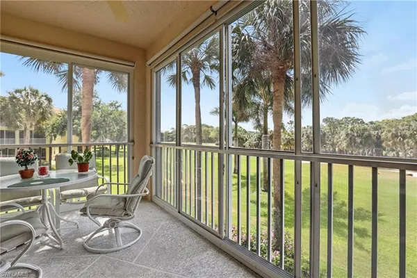 a view of a balcony with lake view