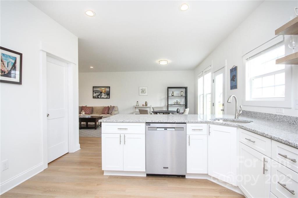 1100 Startown Road Lincolnton, NC 28092 - Photo 14 of 48 a kitchen with white cabinets appliances and sink