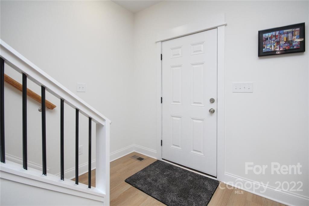 1100 Startown Road Lincolnton, NC 28092 - Photo 19 of 48 a view of staircase with white walls