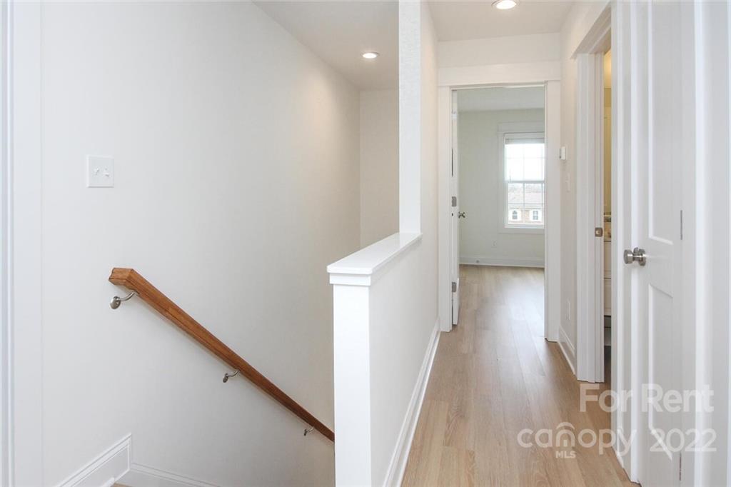 1100 Startown Road Lincolnton, NC 28092 - Photo 21 of 48 a view of a hallway with wooden floor and staircase