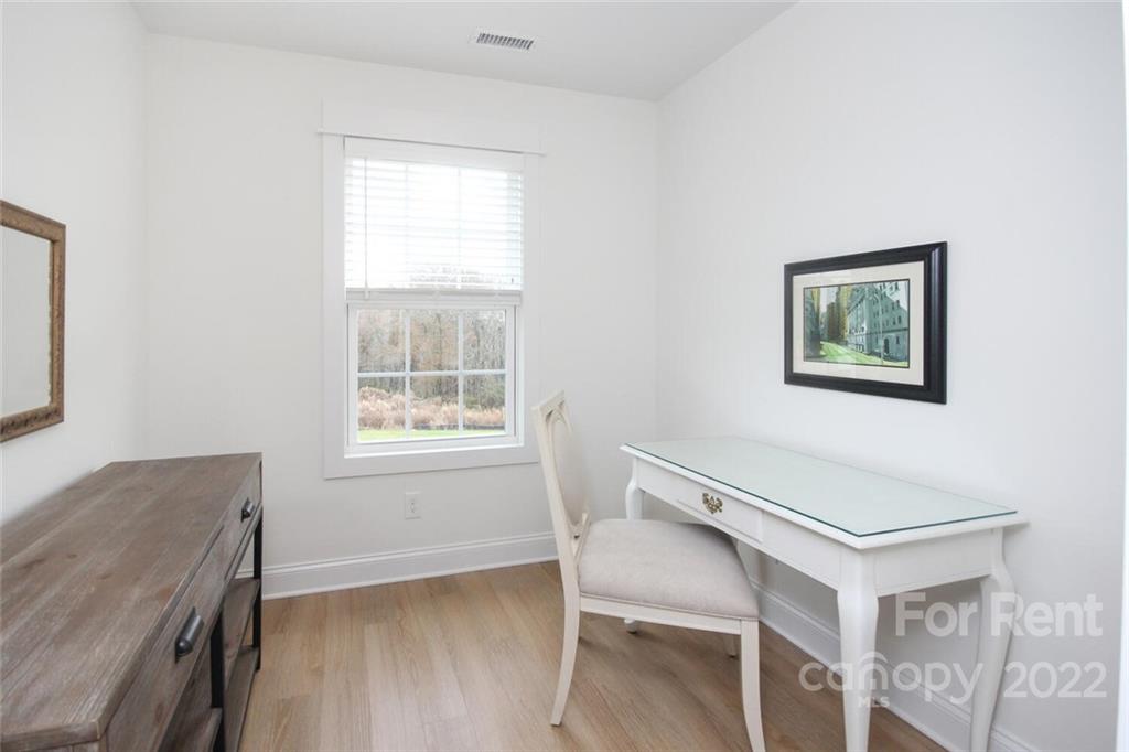 1100 Startown Road Lincolnton, NC 28092 - Photo 22 of 48 a view of a workspace with furniture and a window