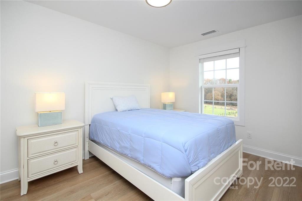 1100 Startown Road Lincolnton, NC 28092 - Photo 34 of 48 a bedroom with a bed and a window