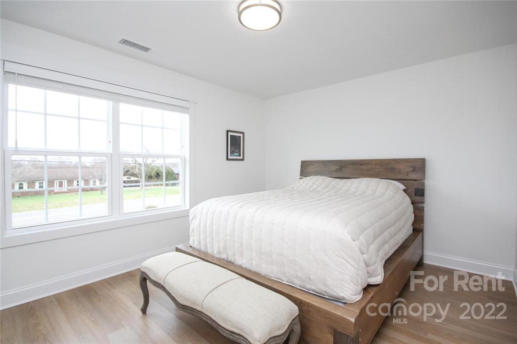 1100 Startown Road Lincolnton, NC 28092 - Photo 40 of 48 a bedroom with a bed and a large window