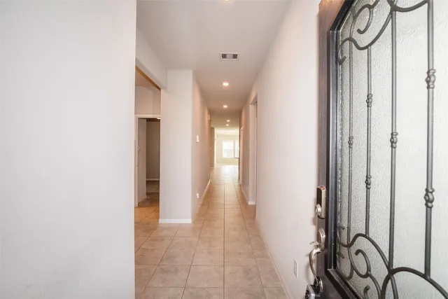 an empty room with closet area