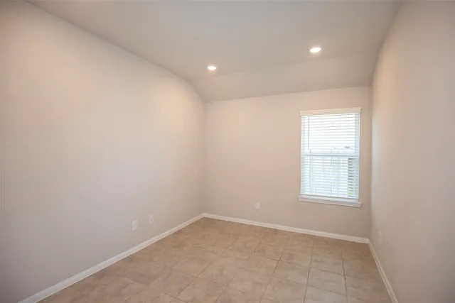 a bathroom with a granite countertop sink a large mirror and vanity