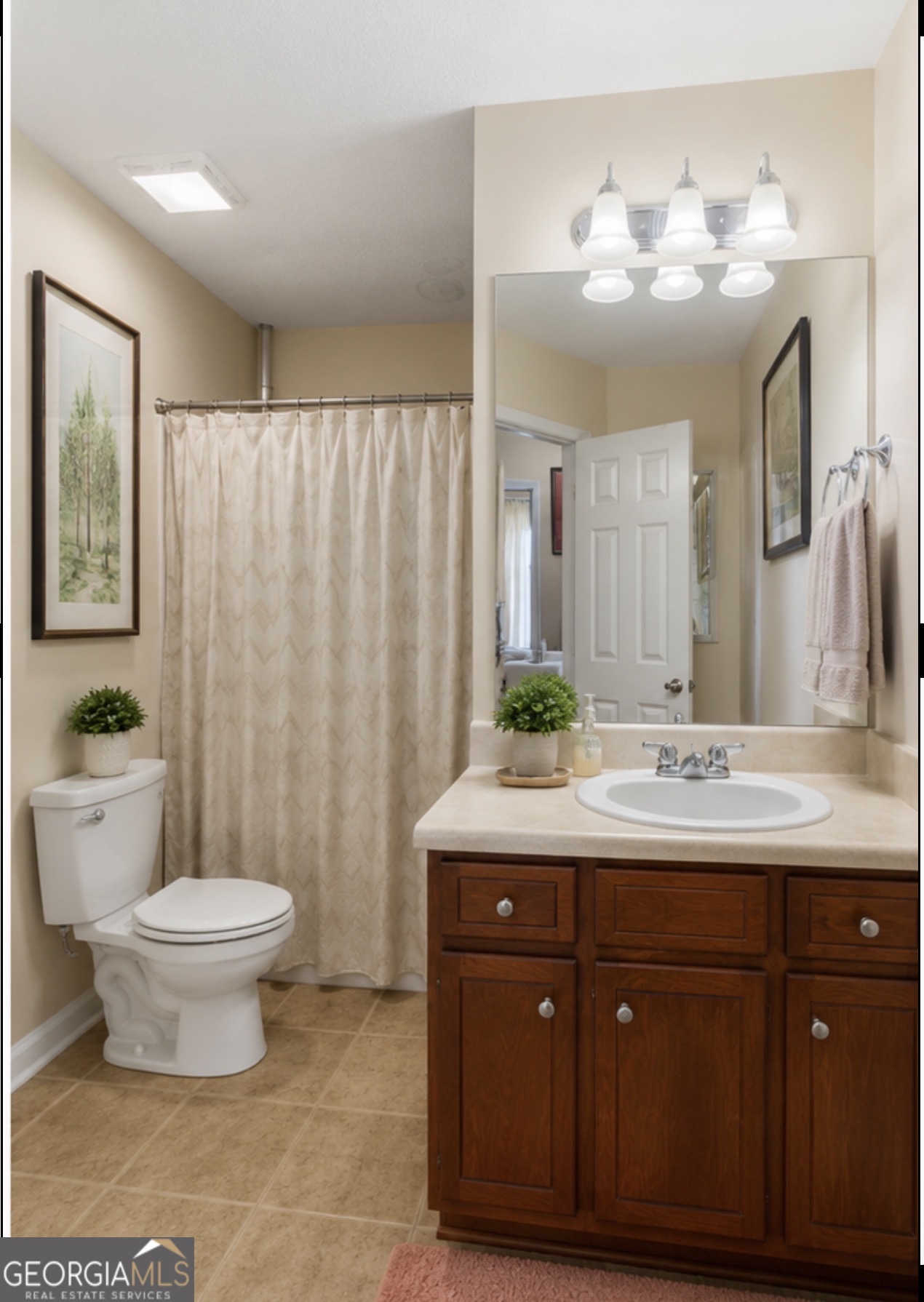 138 Brookfair Lane Leesburg, GA 31763 - Photo 15 of 30 a bathroom with a double vanity sink toilet and a mirror