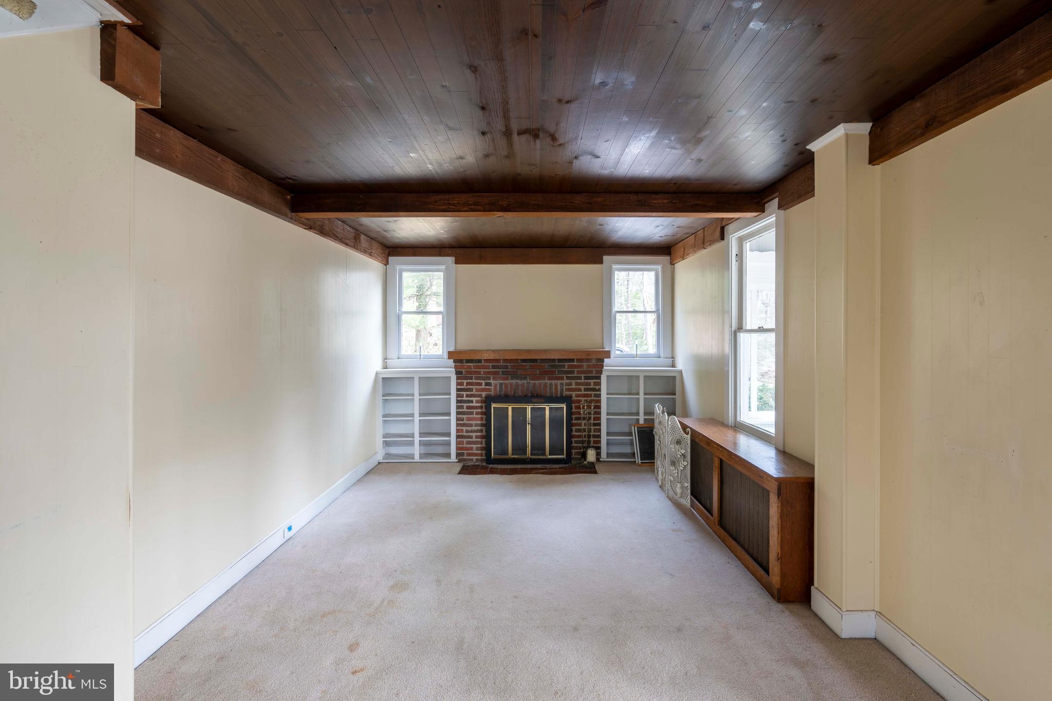 103 Wallace Manor Road Edgewater, MD 21037 - Photo 11 of 15 Living room with wood burning fireplace