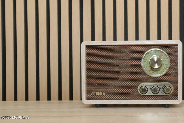 a bedroom with a large bed and a couch