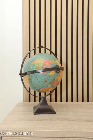 a large kitchen with stainless steel appliances lots of counter space sink and a window