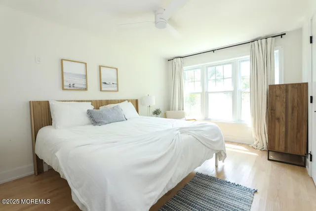 a view of living room with furniture and flat screen tv