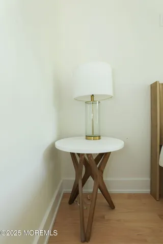 a view of a dining room with furniture and window