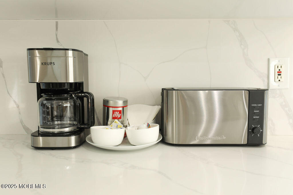 153 Atlantic Avenue Long Branch, NJ 07740 - Photo 23 of 46 a view of living room with furniture and flat screen tv