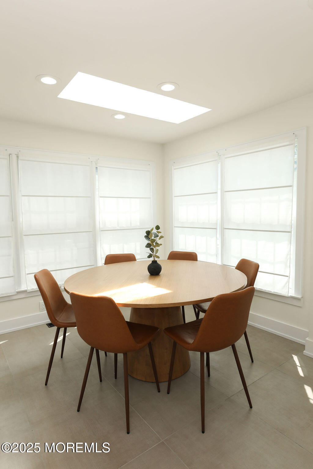 153 Atlantic Avenue Long Branch, NJ 07740 - Photo 25 of 46 a view of a dining room with furniture and window