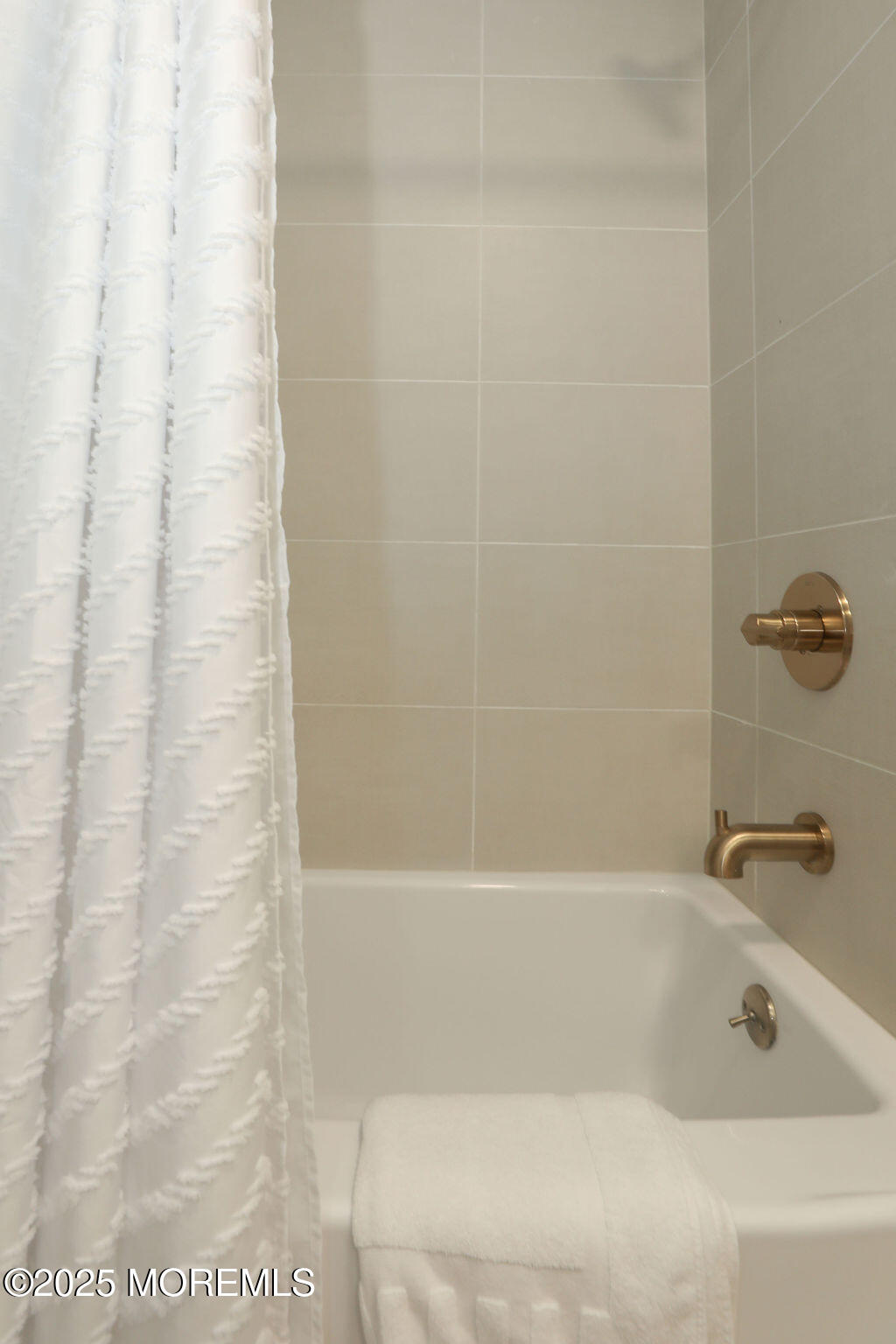 153 Atlantic Avenue Long Branch, NJ 07740 - Photo 30 of 46 a bathroom with a bathtub