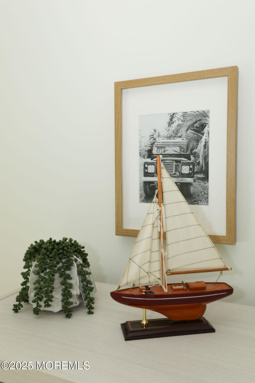 153 Atlantic Avenue Long Branch, NJ 07740 - Photo 37 of 46 a room with a table and painting on the wall